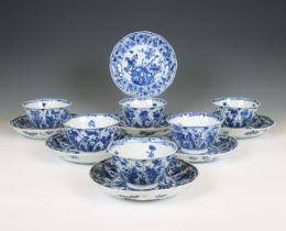 China, a set of six blue and white porcelain cups and seven saucers, Kangxi period (1662-1722),