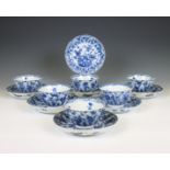 China, a set of six blue and white porcelain cups and seven saucers, Kangxi period (1662-1722),