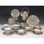 China, a Canton famille rose porcelain part coffee- and tea-service, ca. 1900,