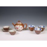 China, a small collection of café-au-lait-ground famille rose porcelain tea ware, 18th century,
