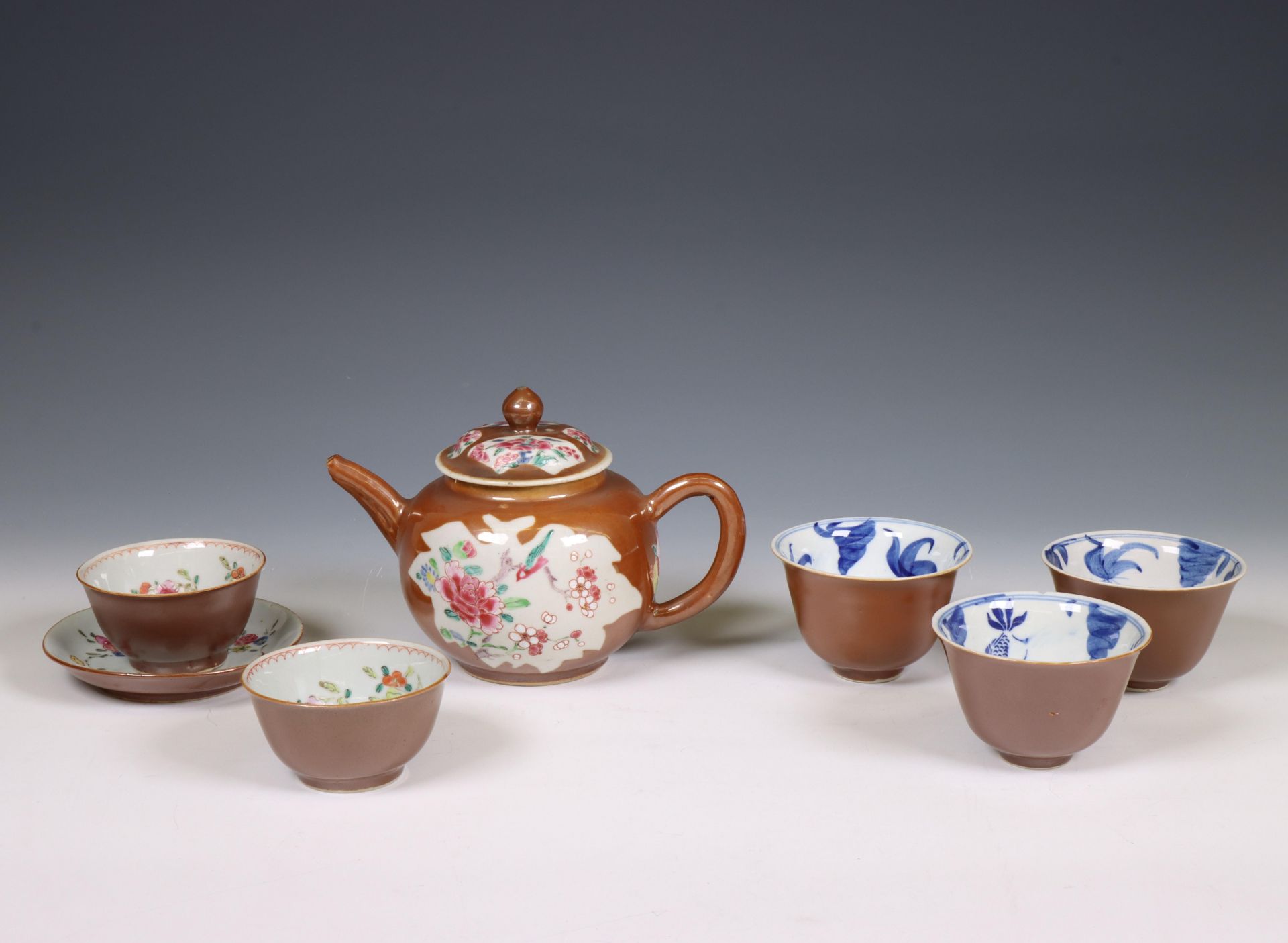 China, a small collection of café-au-lait-ground famille rose porcelain tea ware, 18th century,