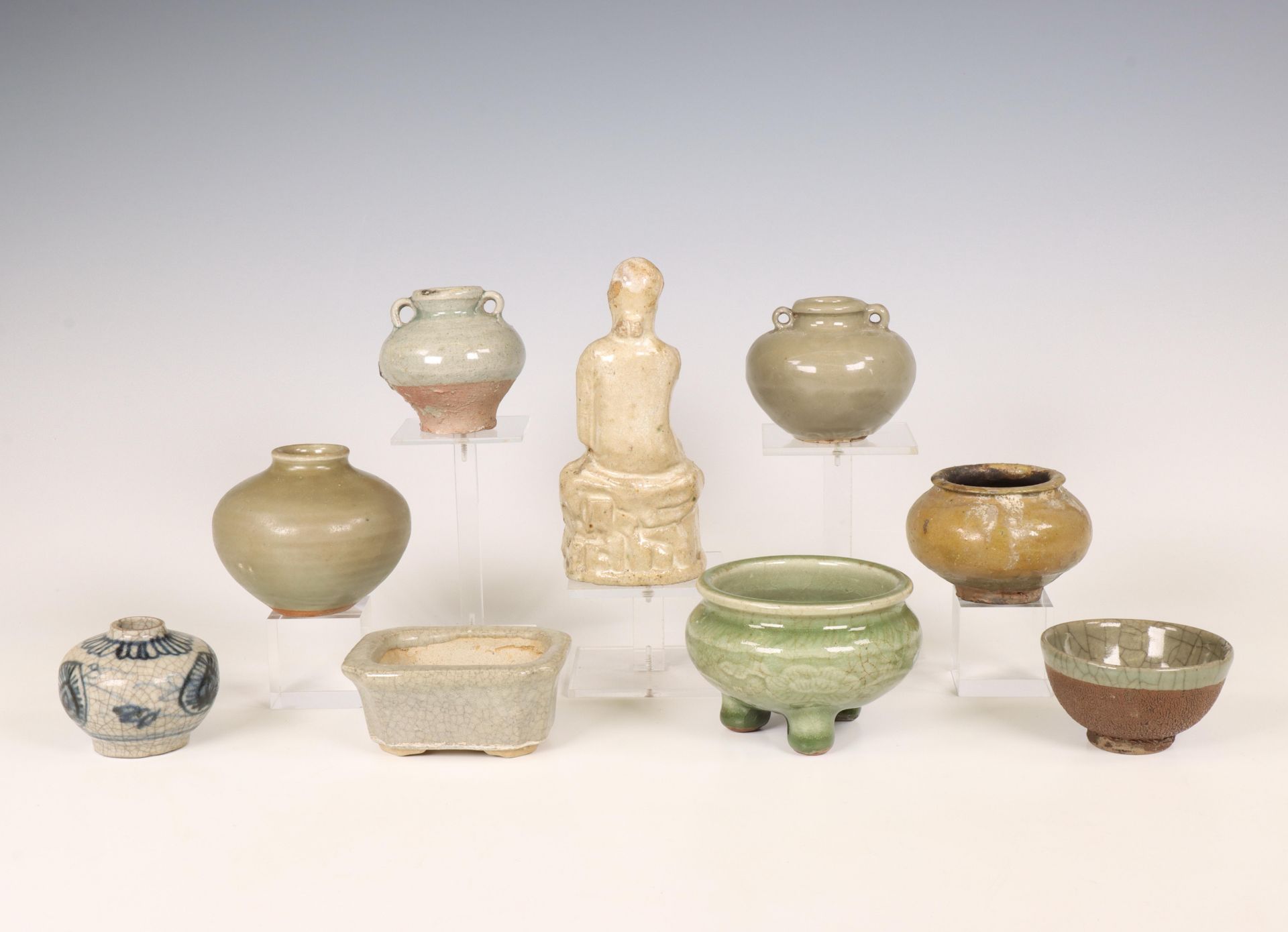 China and Southeast Asia, a collection of celadon and cream-glazed jars and a figure, Ming dynasty ( - Image 2 of 5