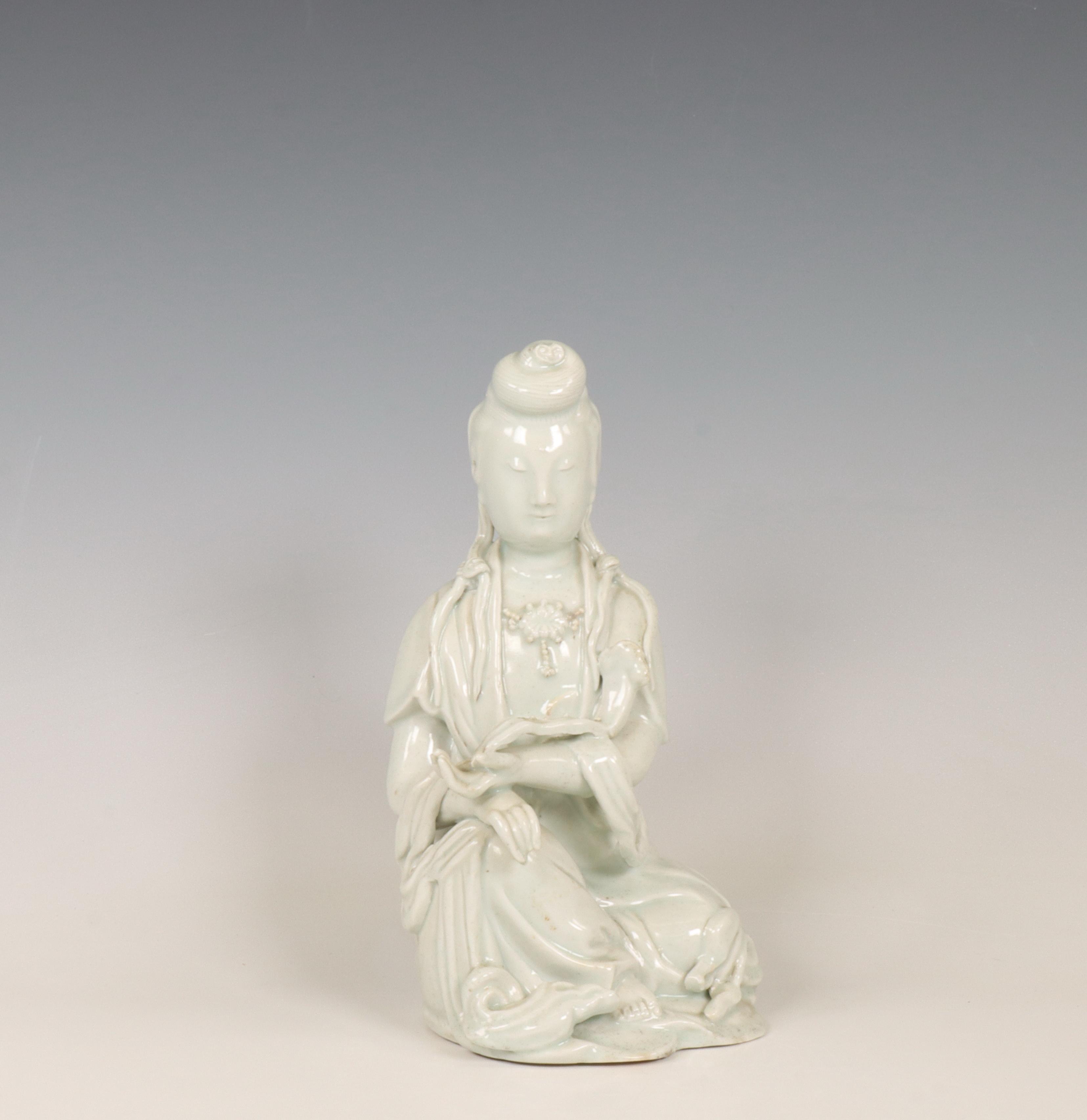 China, a white-glazed porcelain figure of Guanyin, ca. 1900,