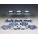 China, a set of blue and white porcelain octagonal 'lotus' cups and two sets of saucers, 18th centur
