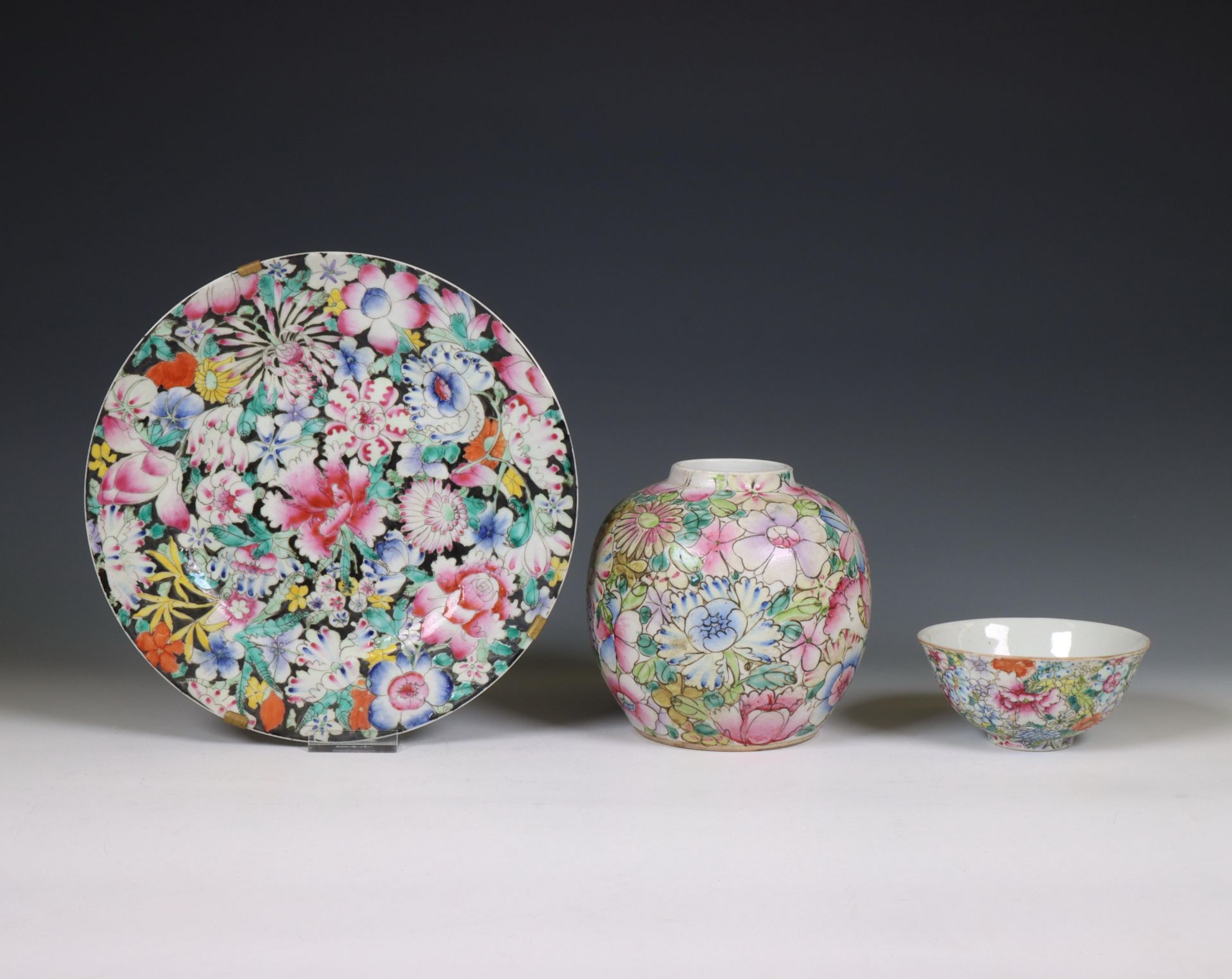 China, a small collection of famille rose 'millefleurs' porcelain, late 19th century,