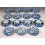 China, a set of four blue and white porcelain cups and fifteen saucers, Kangxi period (1662-1722),