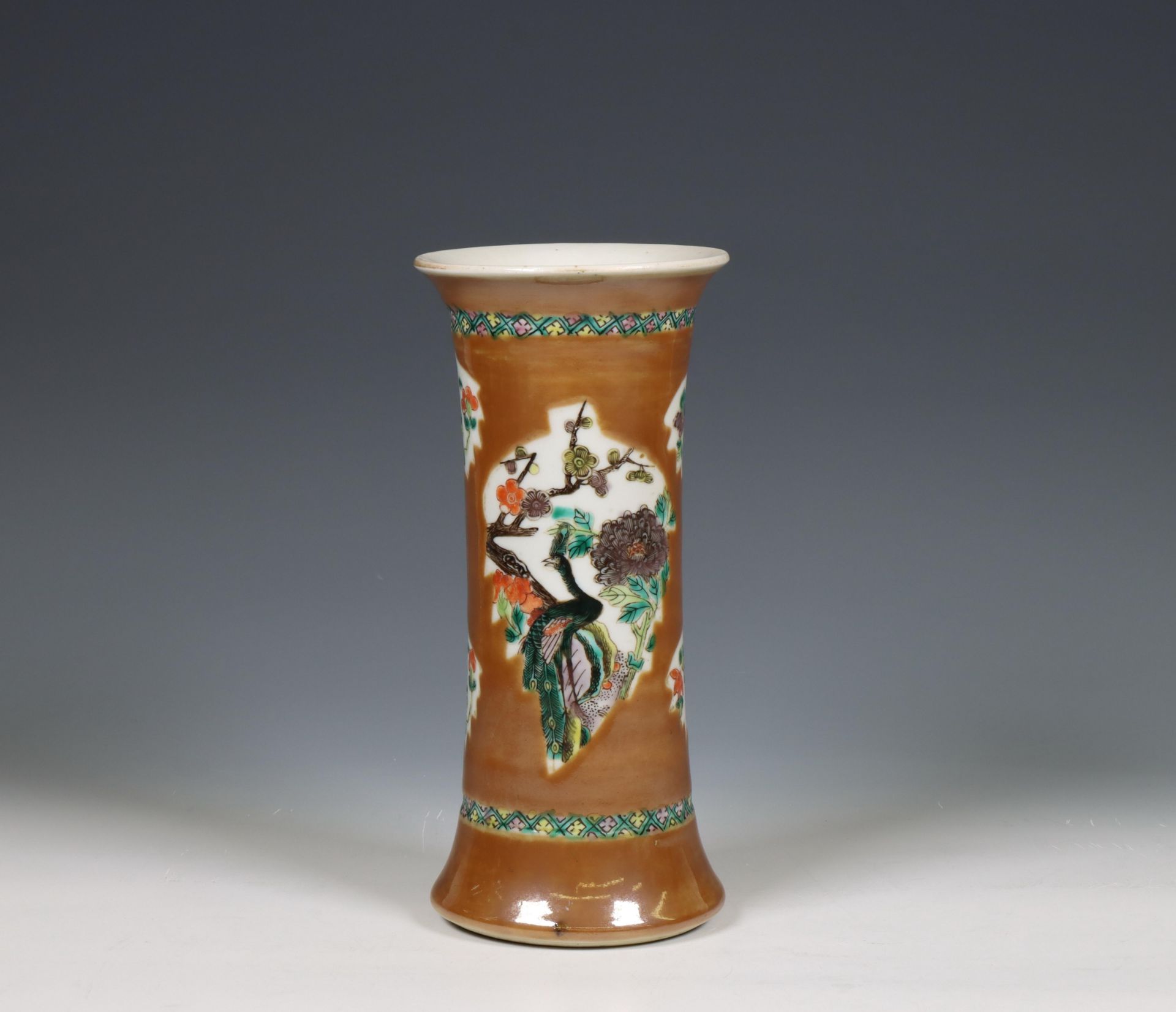 China, a café-au-lait-ground famille verte porcelain trumpet vase, 18th century,