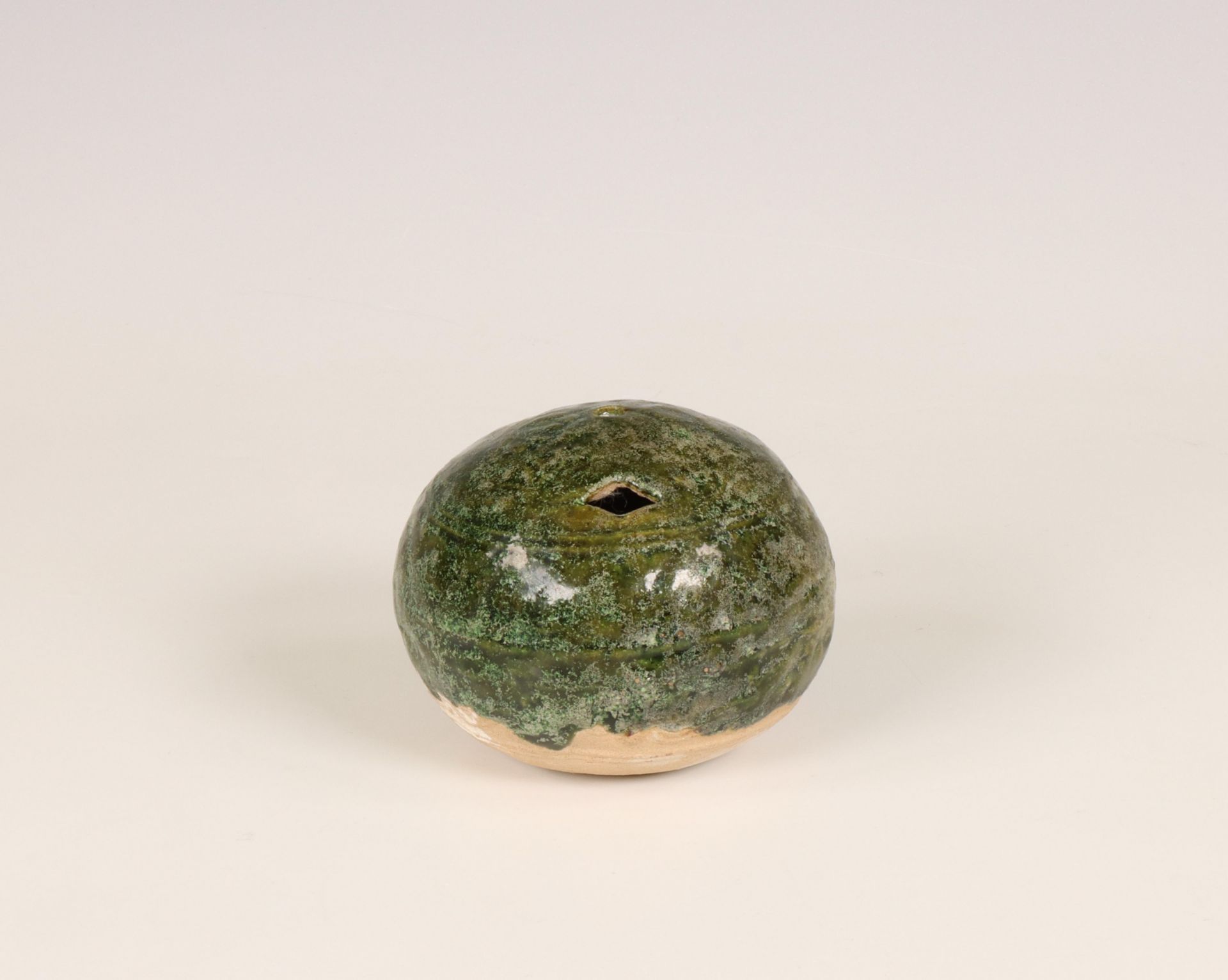 China, a green-glazed earthenware whistle, probably Eastern Han dynasty (25-220 BC),