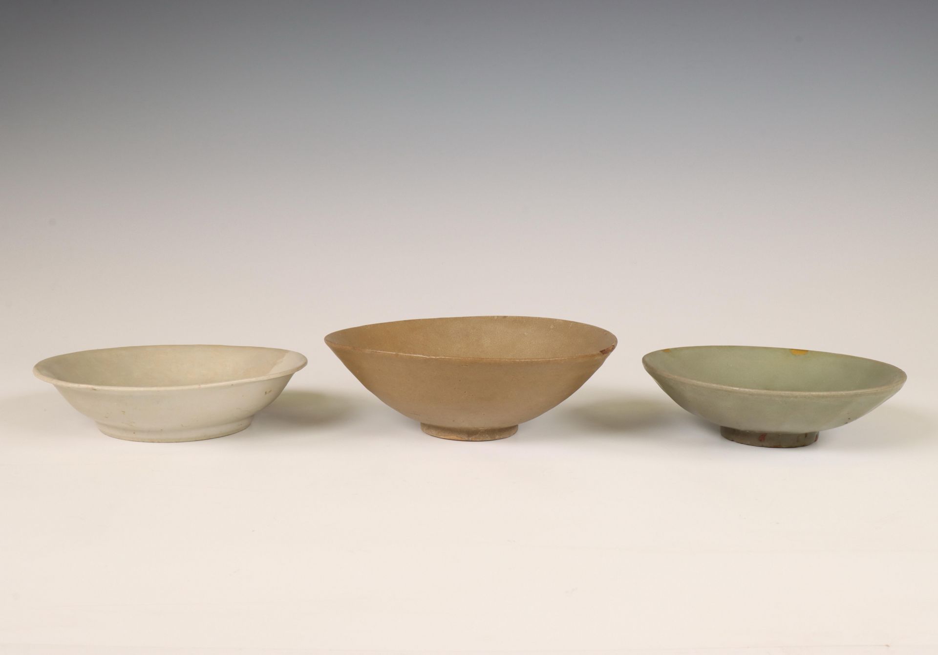 China, three various celadon-glazed bowls, Song dynasty (960-1279) and later,