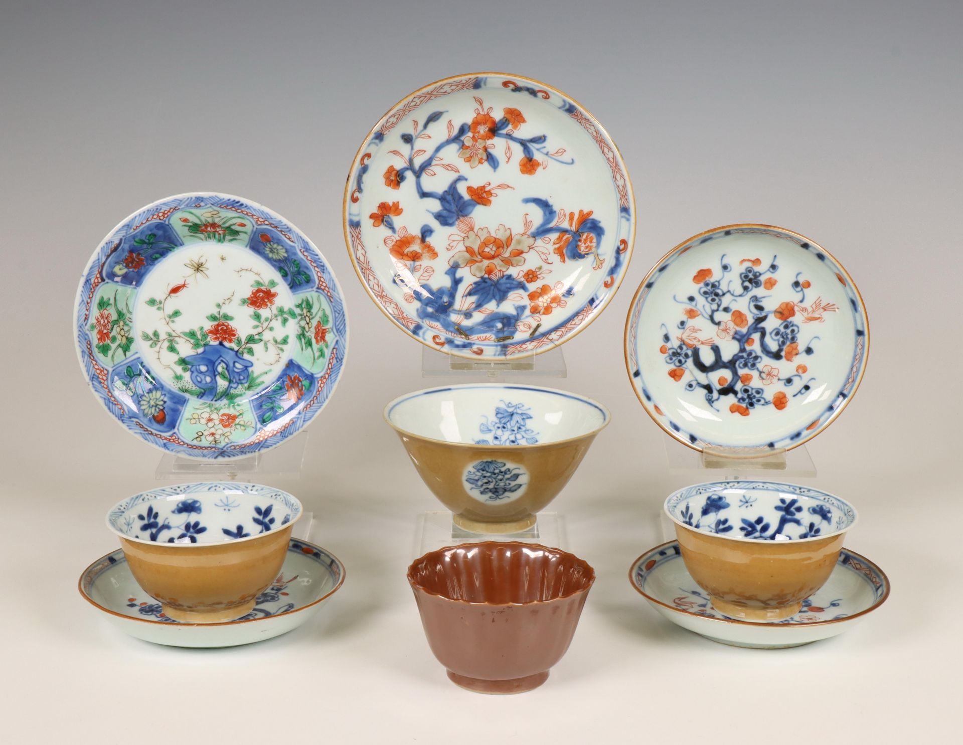 China, a small collection of polychrome porcelain cups and saucers, 18th century,