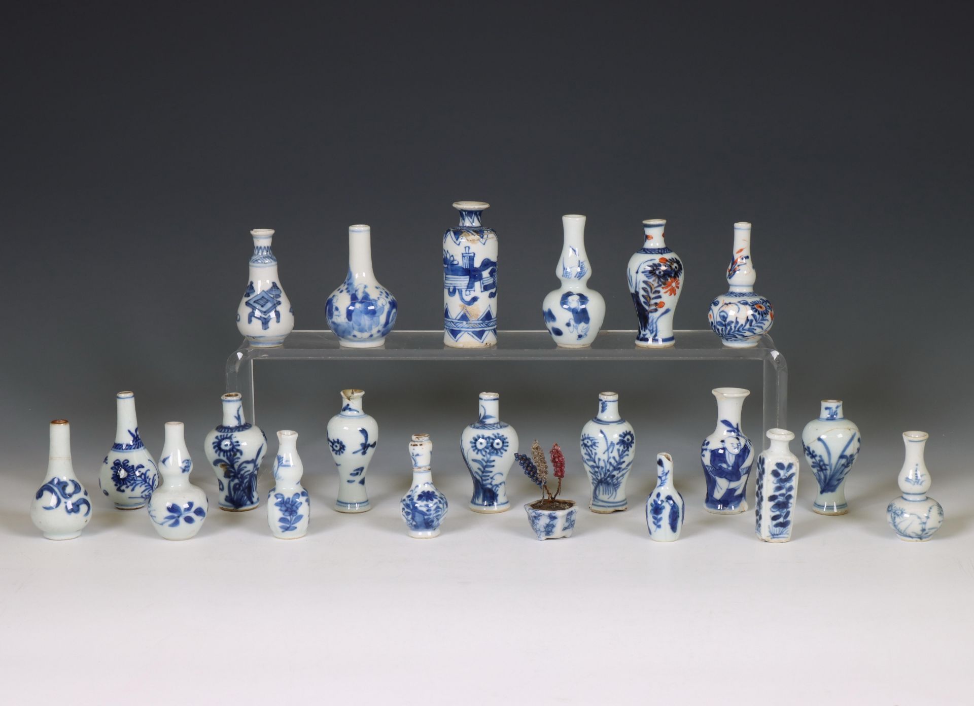 China, a collection of blue and white miniature vases, 18th century and later,