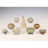 China and Southeast Asia, a collection of celadon and cream-glazed jars and a figure, Ming dynasty (