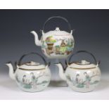 China, a pair and a single famille rose porcelain teapots, 20th century,