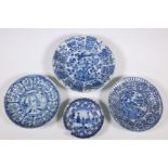 China, four various blue and white porcelain plates, Kangxi period (1662-1722) and later,