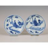 China, a pair of blue and white porcelain saucer dishes, Kangxi period (1662-1722),