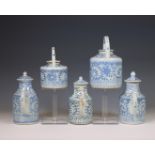 China, a collection of five blue and white porcelain teapots and milk-jugs and covers, 20th century,