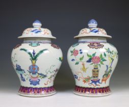 China, a pair of famille rose porcelain baluster jars and covers, 20th century,