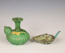 China, a green-glazed biscuit kendi and dish, 19th-20th century,