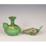 China, a green-glazed biscuit kendi and dish, 19th-20th century,