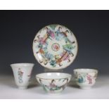 China, a famille rose porcelain cup and saucer and two cups, 19th century,