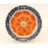 China, blue and white and iron-red decorated 'lotus' plate, 19th century,