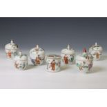 China, seven small famille rose porcelain 'boys' boxes and covers, 19th-20th century,