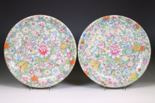 China, a pair of famille rose porcelain 'millefleurs' dishes, ca. 1900,