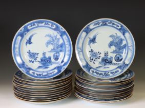 China, a set of twenty-four blue and white porcelain 'Cuckoo in the House' plates, 18th century,