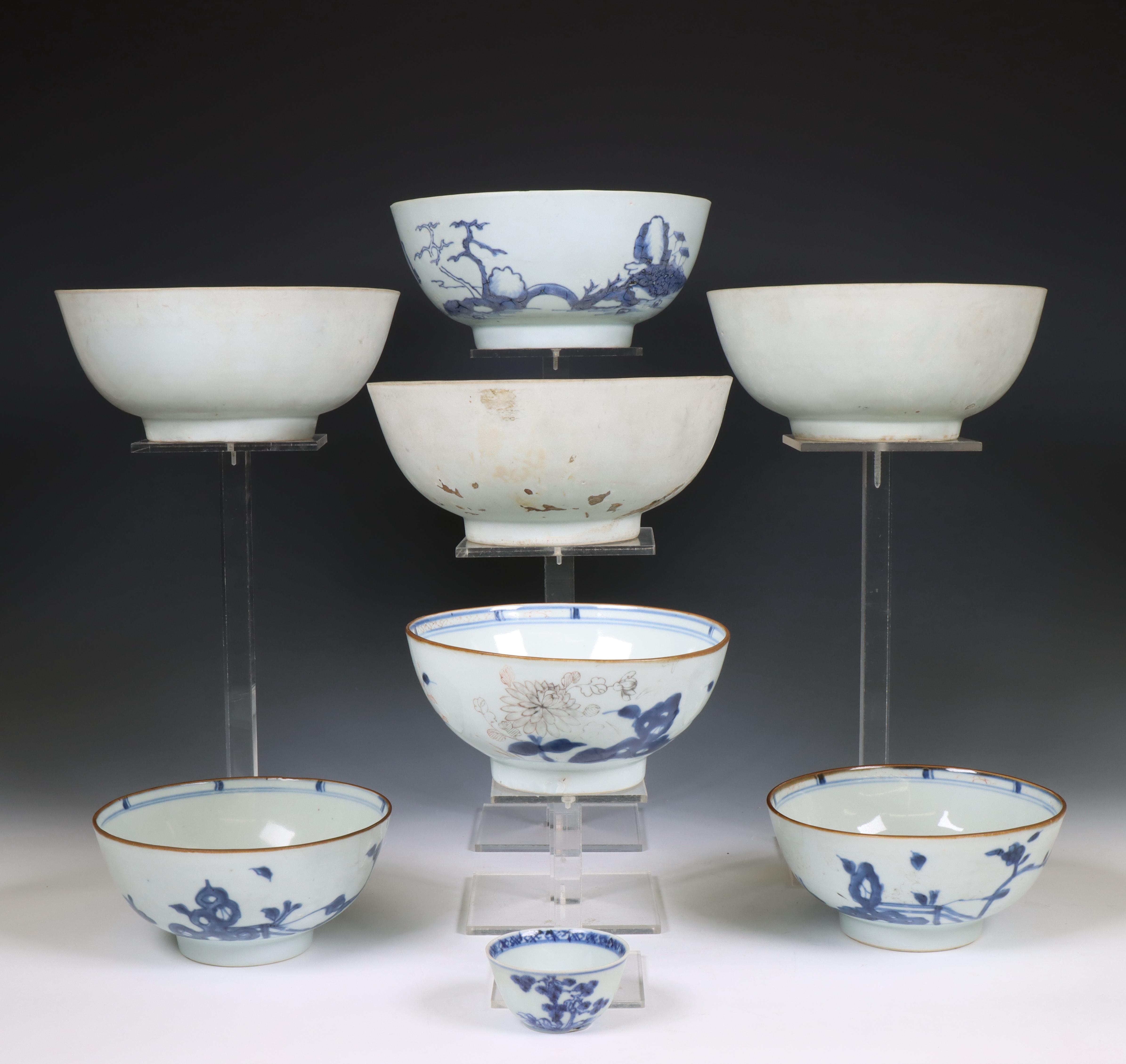 China, a collection of blue and white and white-glazed 'Nanking Cargo' porcelain, Qianlong period, c