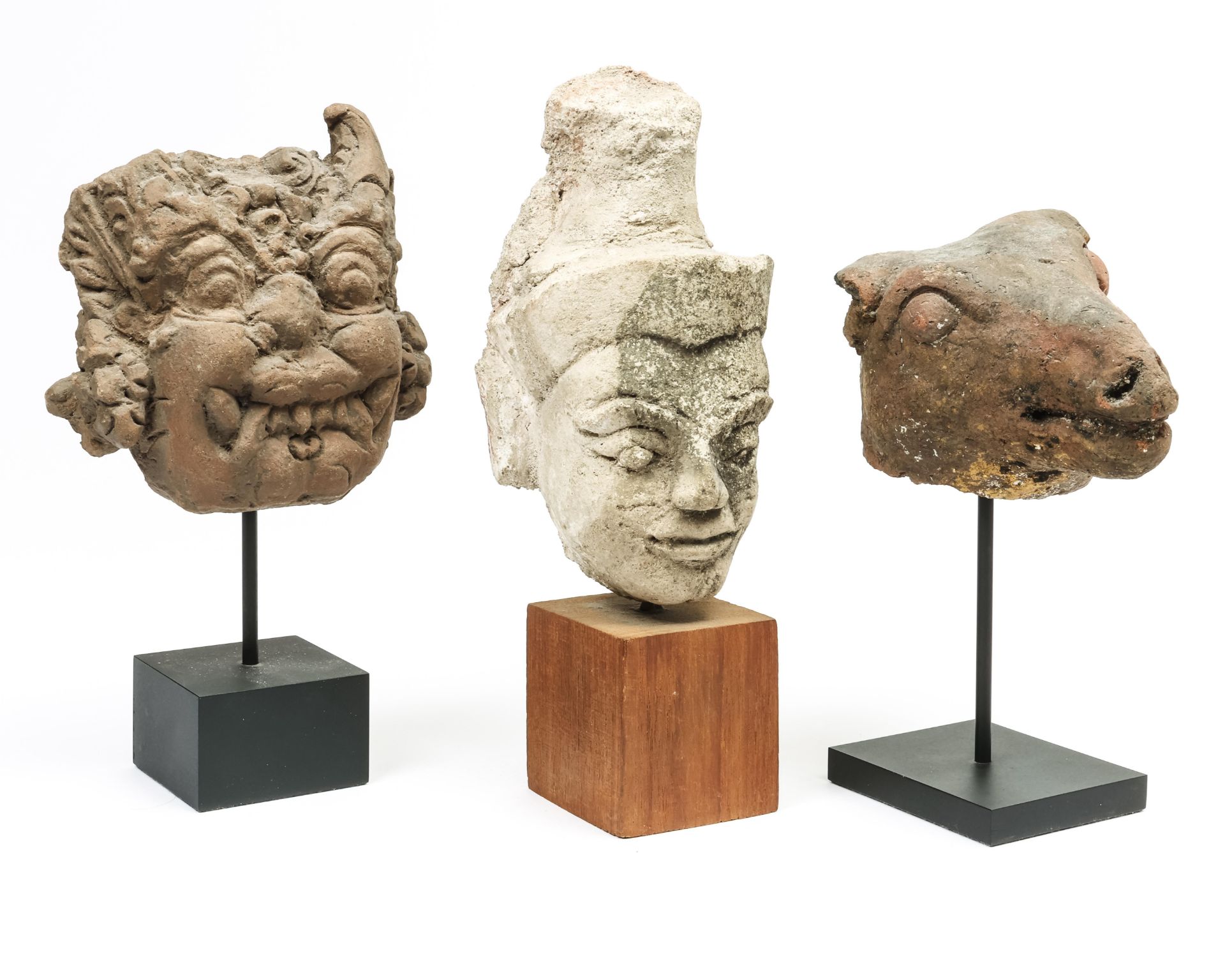 Thailand, a stucco head and Indonesia,a terracotta Ram's head and a demon head, ca. 19th century. - Image 3 of 3