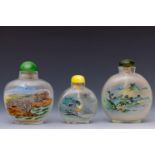 China, three reverse glass painted 'landscape' snuff bottles and stoppers, 20th century,