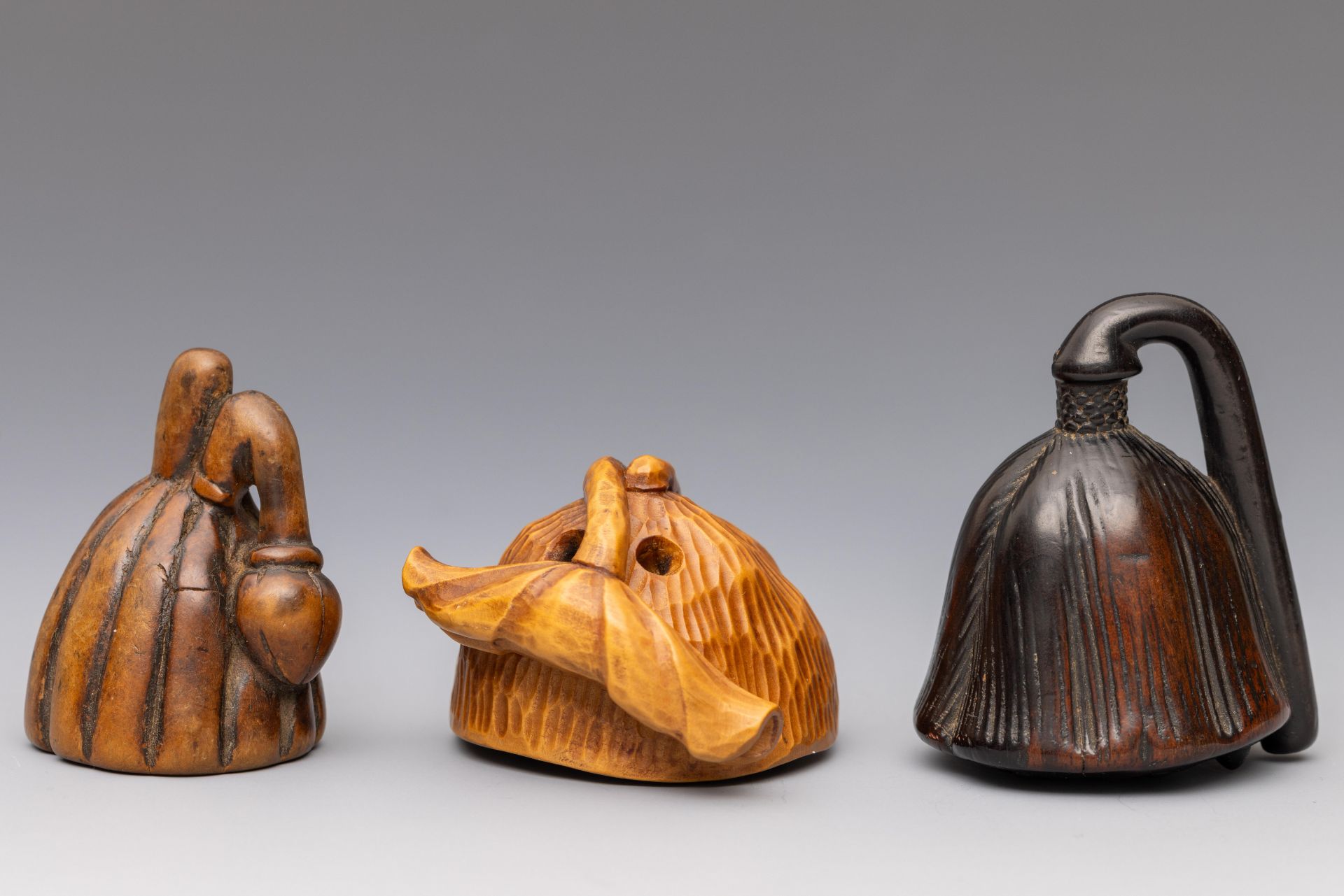 Japan, three wooden netsukes, 19th and 20th century;