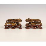 China, pair of tiger's eye models of lions, late Qing dynasty (1644-1912),