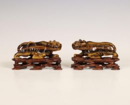 China, pair of tiger's eye models of lions, late Qing dynasty (1644-1912),