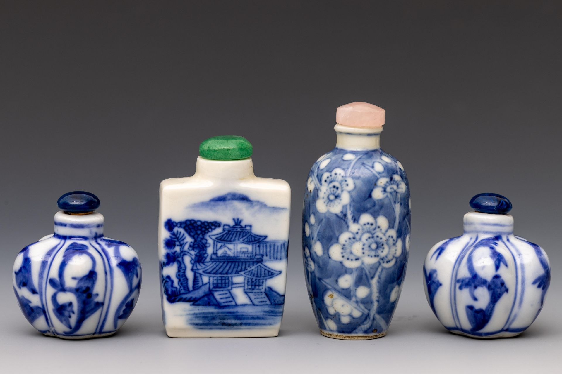 China, four blue and white porcelain snuff bottles and stoppers, 19th-20th century,