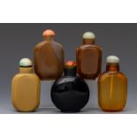 China, five glass snuff bottles and stoppers, late Qing dynasty (1644-1912),