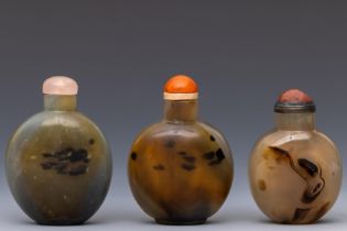China, three agate snuff bottles and covers,