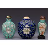 China, three polychrome porcelain snuff bottles and stoppers, late Qing dynasty (1644-1912),