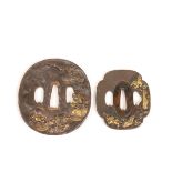 Japan, two iron tsuba's with gold- and silver inlay, Edo period (1615-1868);