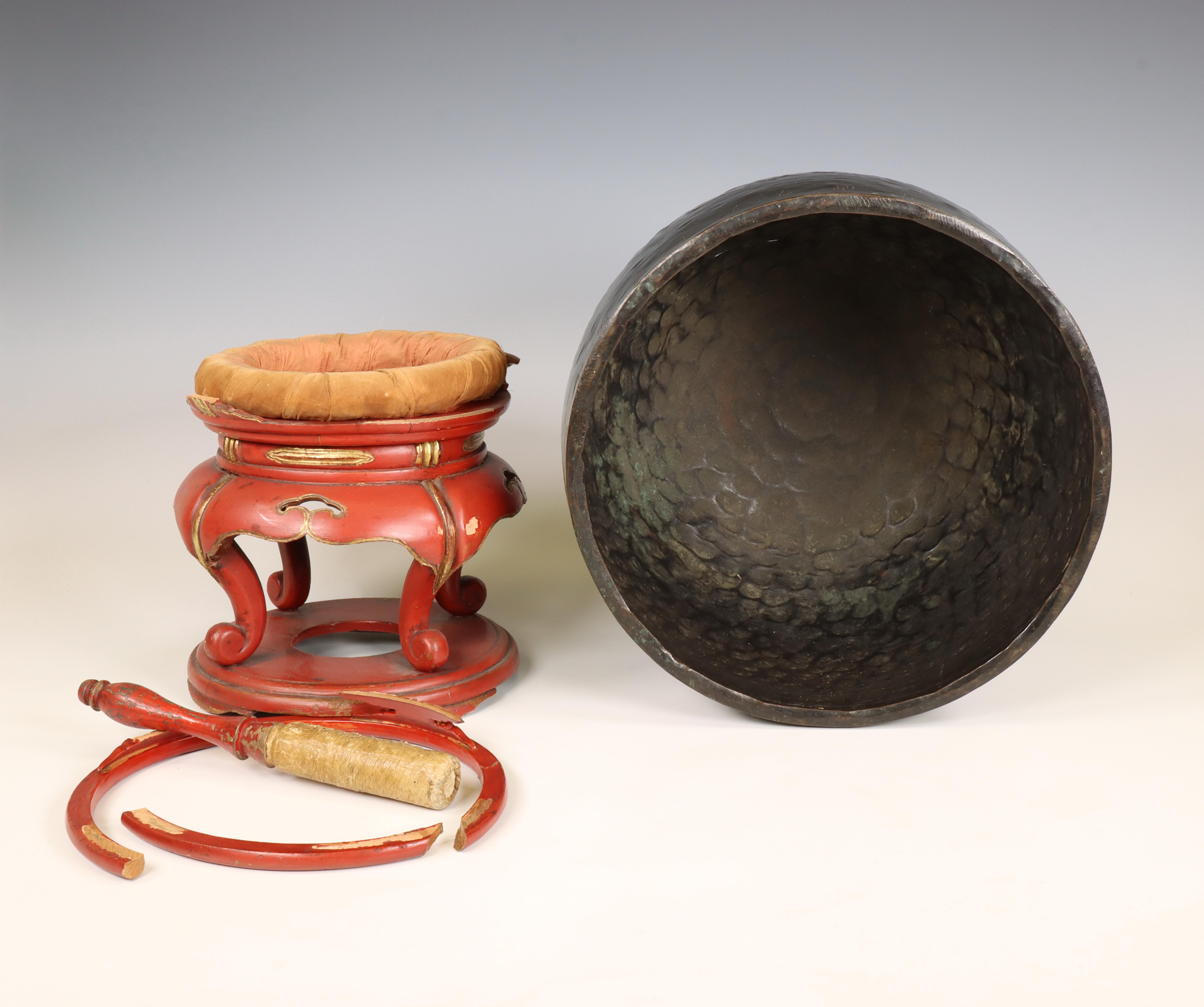 Japan, a metal alloy temple bell on red lacquer stand, 20th century, - Image 6 of 6