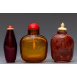China, three glass snuff bottles and stoppers, late Qing dynasty (1644-1912),