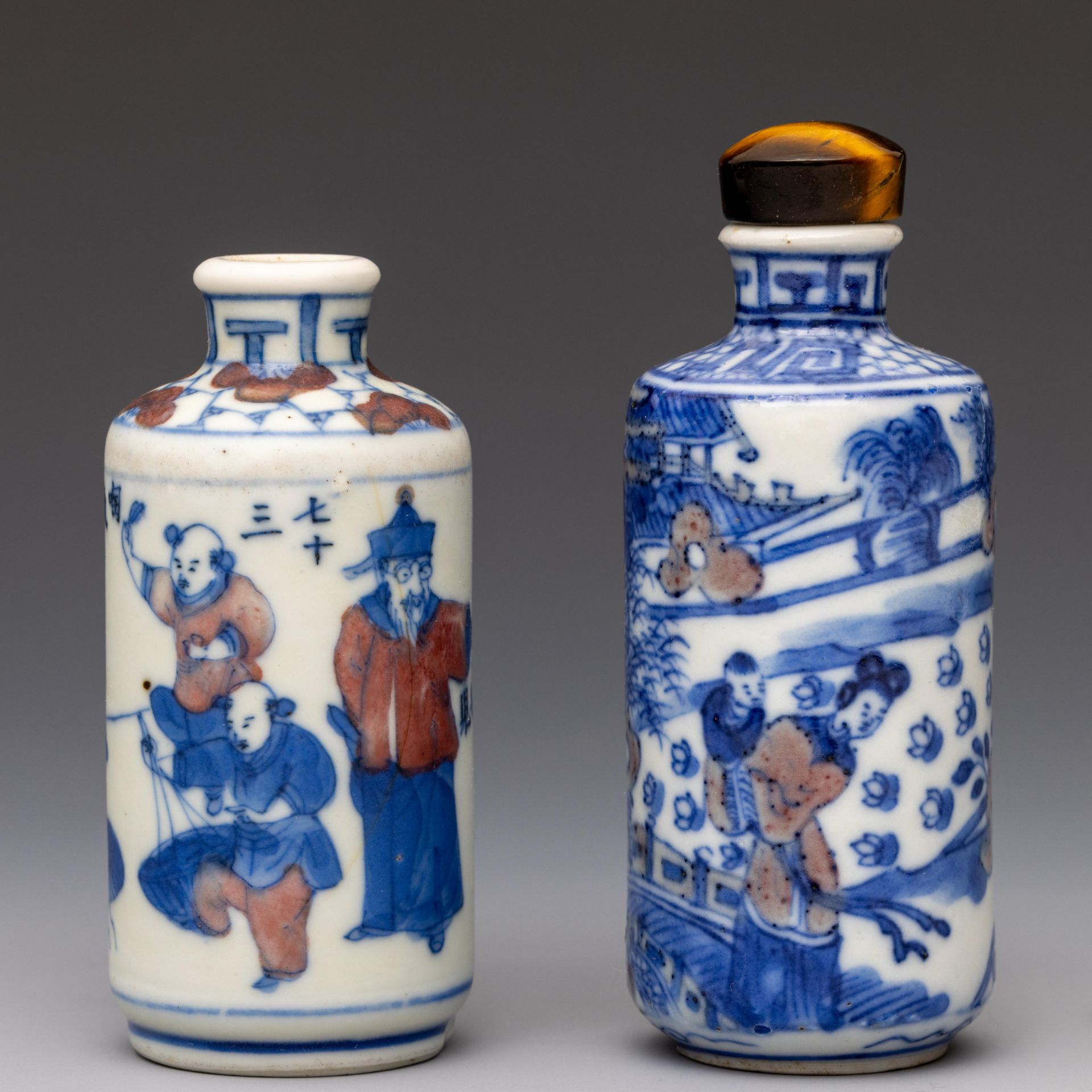 China, two blue and white and iron-red porcelain figural snuff bottles and one stopper, 19th century