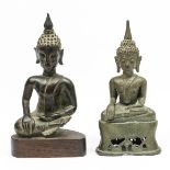 North Thailand, a bronze Buddha Sakyamuni seated on a throne, 17th century and Thailand, bronze Budd