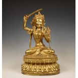 Tibeto-China, gilt bronze figure of Manjushri, 20th century,