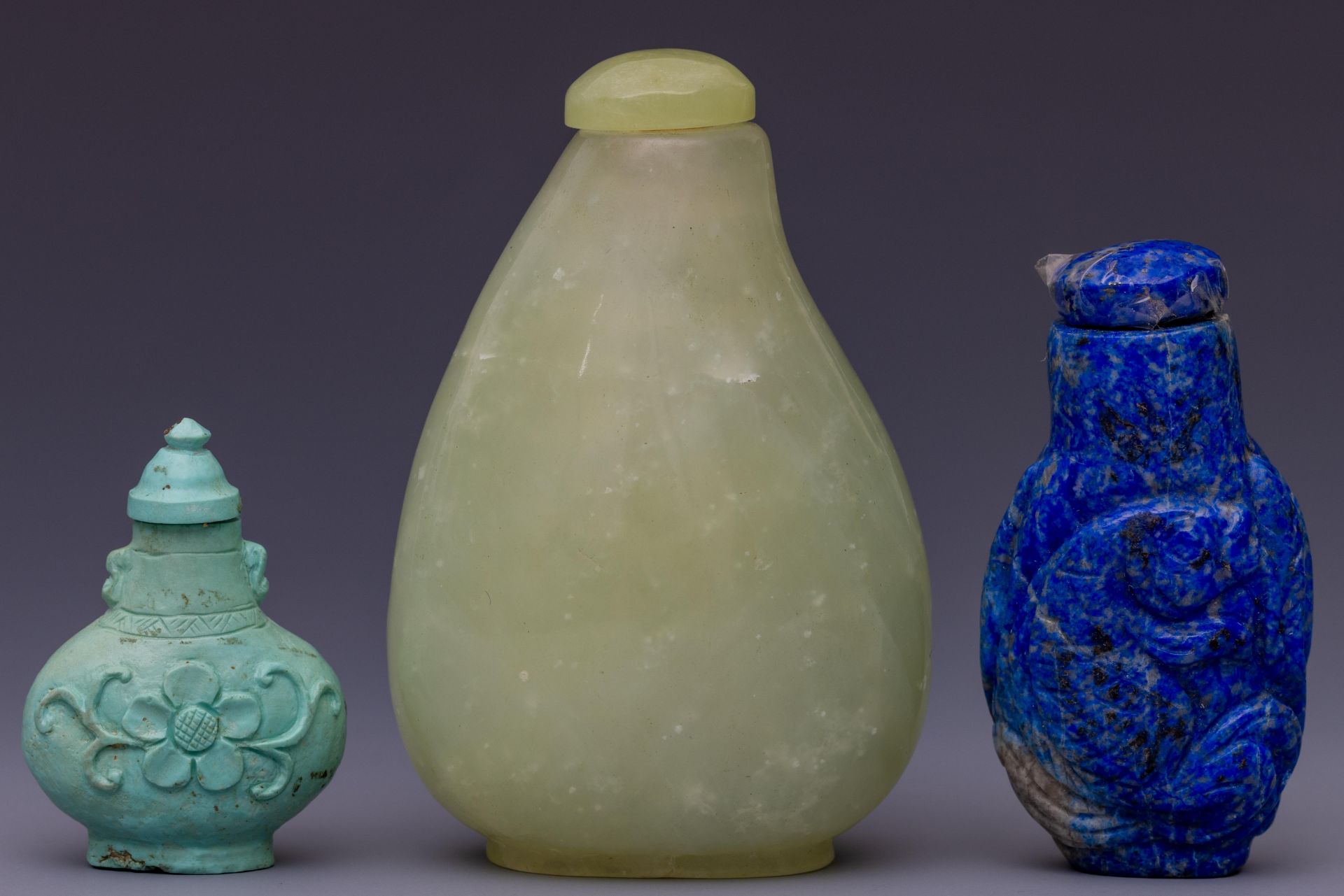 China, three various snuff bottles and stoppers,