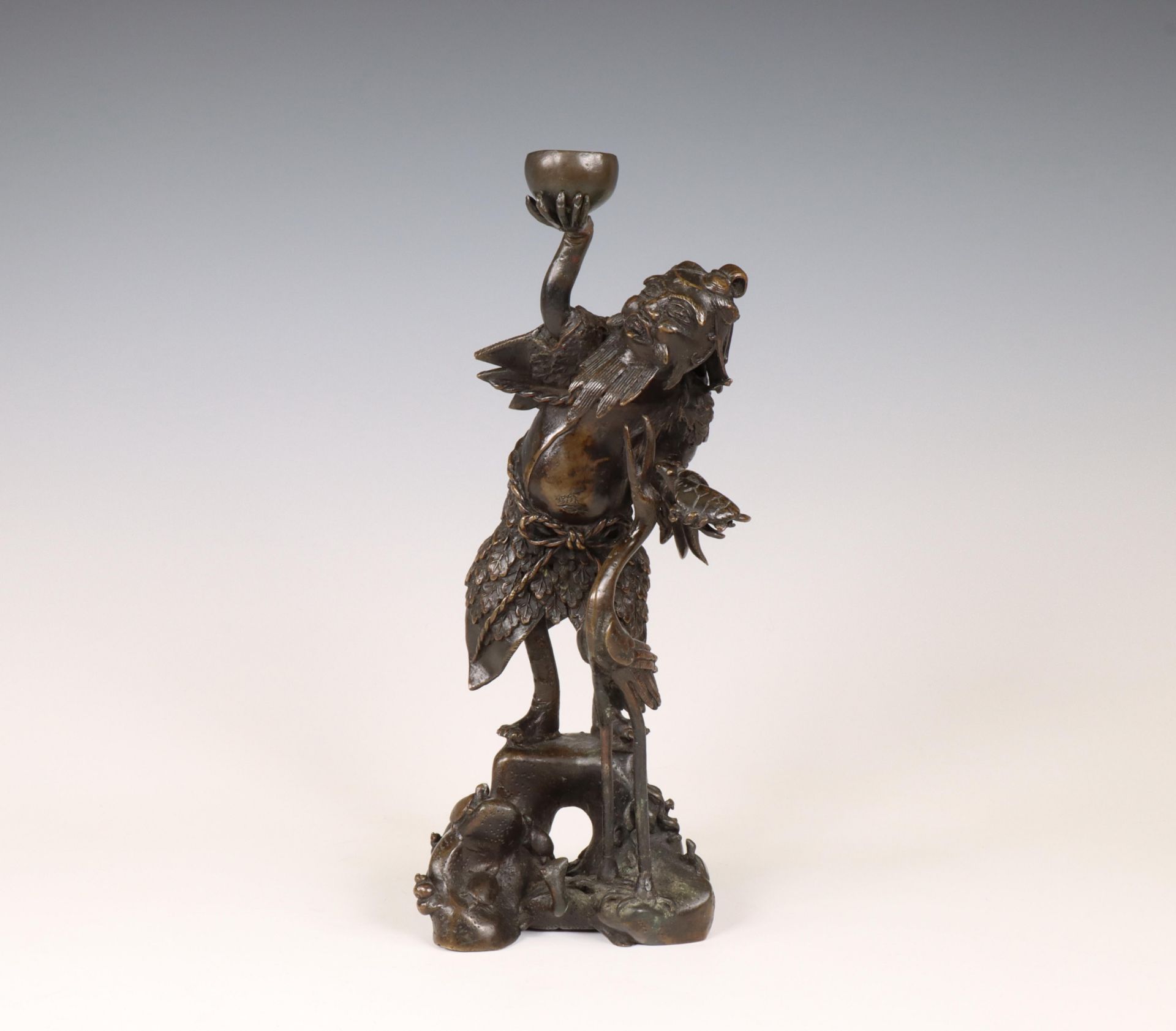 China, a bronze incense holder in the shape of an immortal, Ming dynasty, 17th century,