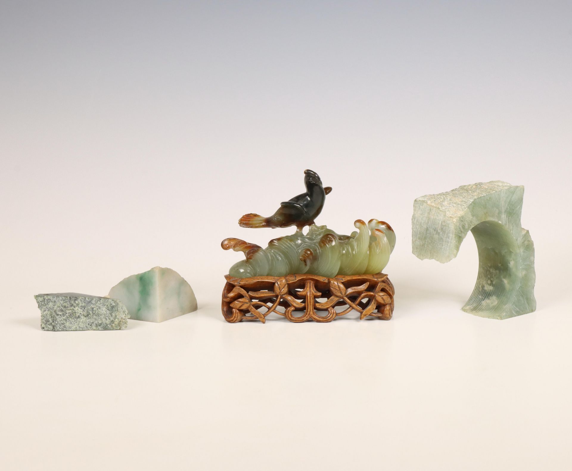 China, jade carving of a bird and three jade stones, late Qing dynasty (1644-1912),