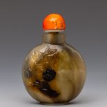 China, a carved agate snuff bottle and cover,