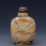 China, a fossilised mammoth tooth snuff bottle and cover,