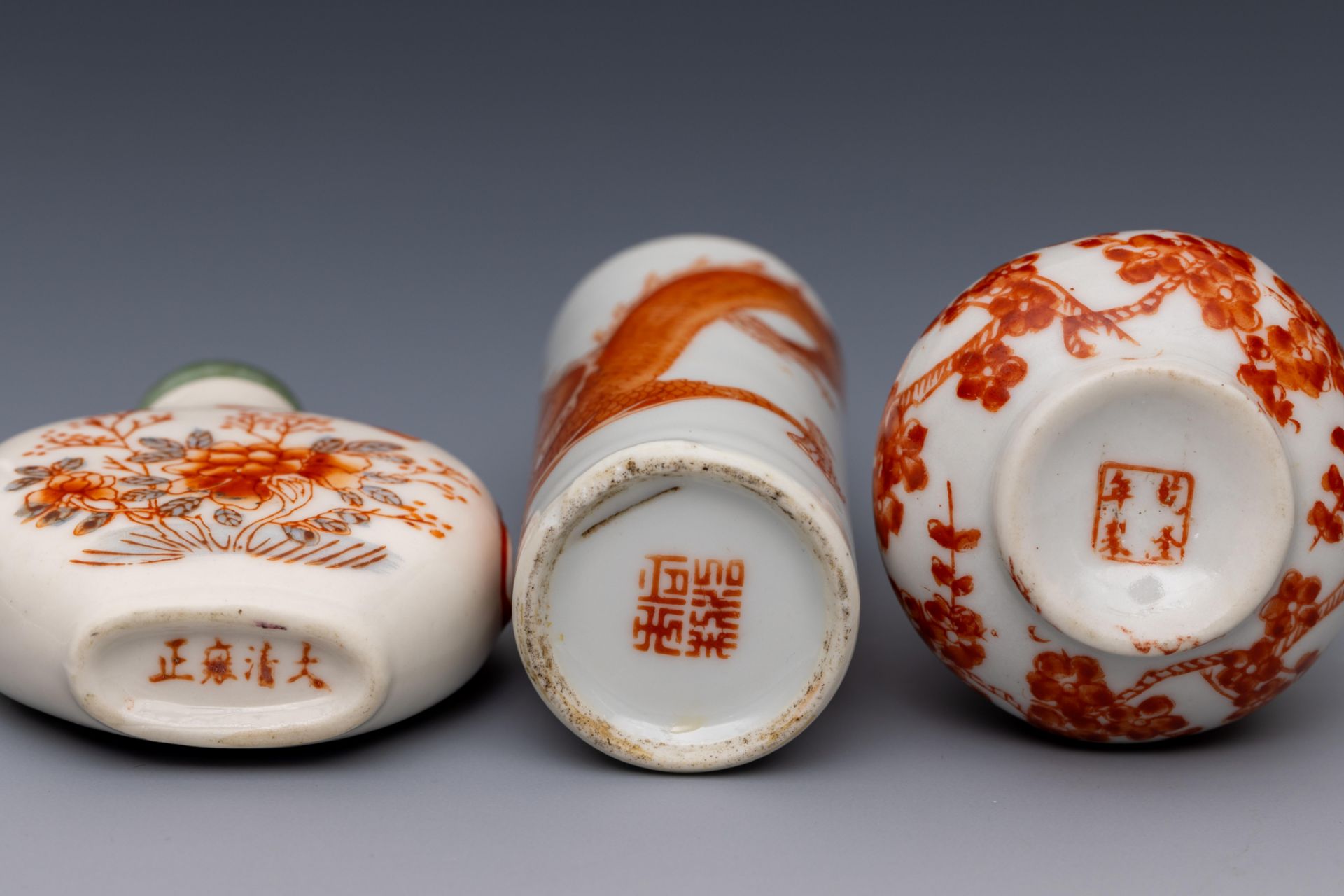 China, three iron-red decorated porcelain snuff bottles and stoppers, late 19th/ 20th century, - Image 3 of 3